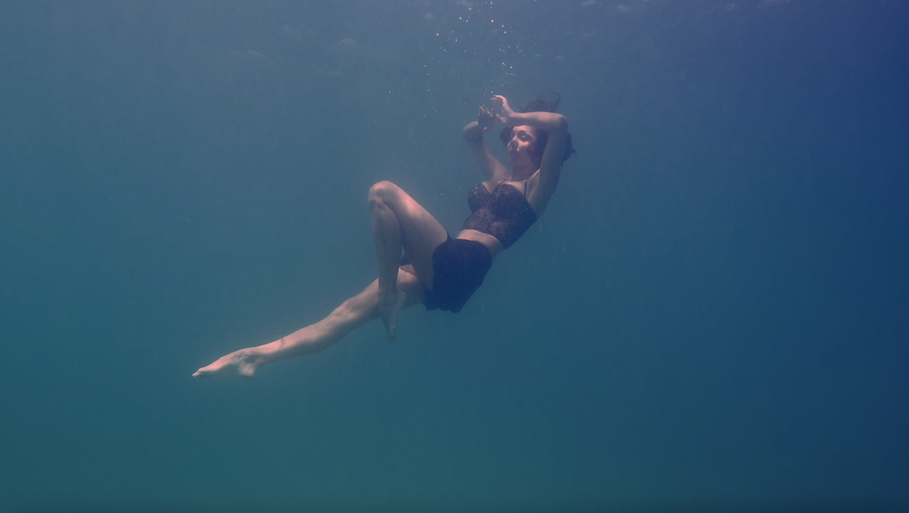 Ballerina Jacinta Christos dances beautifully underwater, as a Swan's Feather
